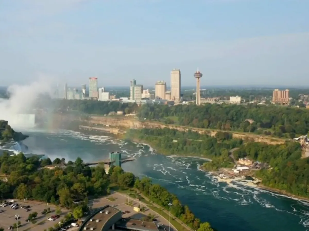 a view of a large body of water with a city in the background