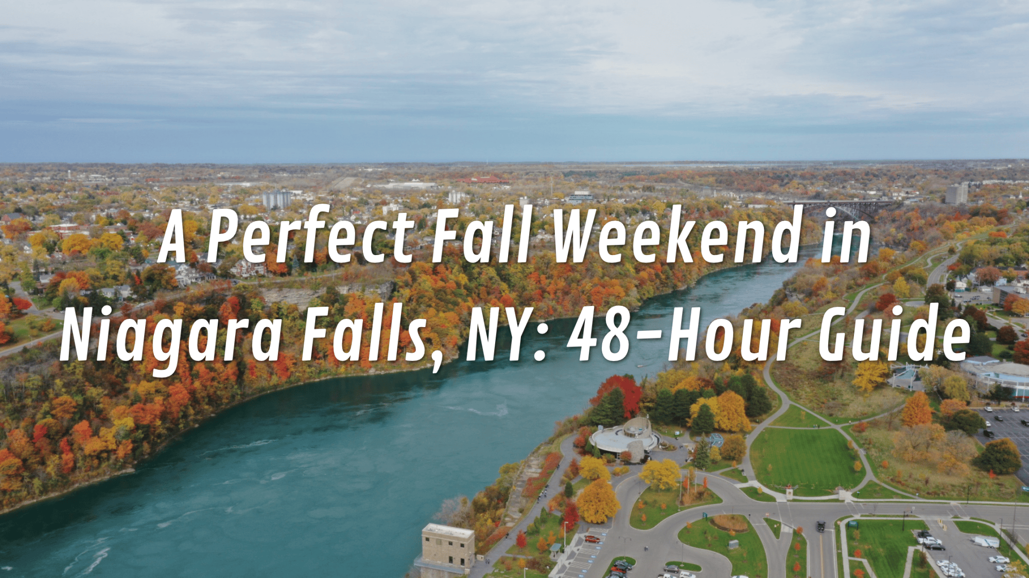 Arial view of river and fall foliage, text 'A Perfect Fall Weekend in Niagara Falls, NY: 48-Hour Guide' overlay.
